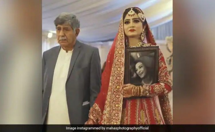 মৃত মায়ের ছবি বুকে জড়িয়ে বিয়ের আসরে মেয়ে