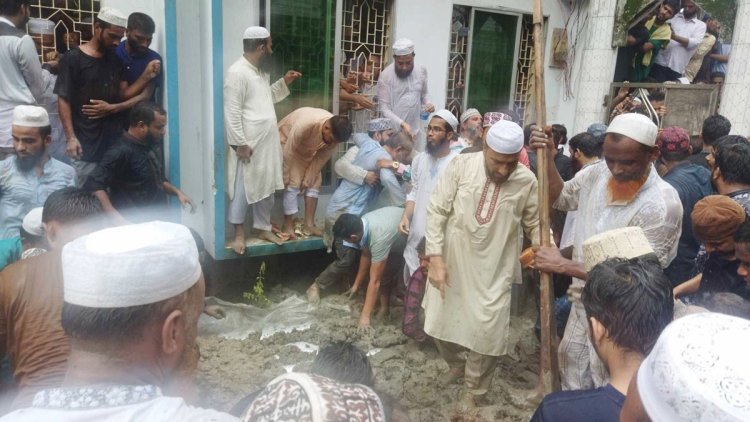 ছেলের কবরের পাশে চিরনিদ্রায় শায়িত দেলাওয়ার হোসাইন সাঈদী